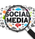 Magnified illustration with the word Social Media on white background.